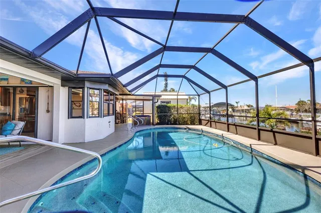 a view of a swimming pool with an ocean