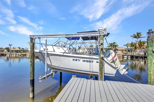 a view of a balcony with chairs