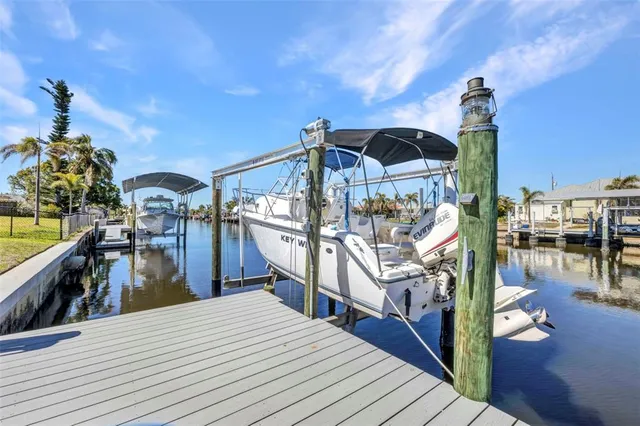 $600,000 | 122 Colonial Street Southeast, Port Charlotte, FL 33952