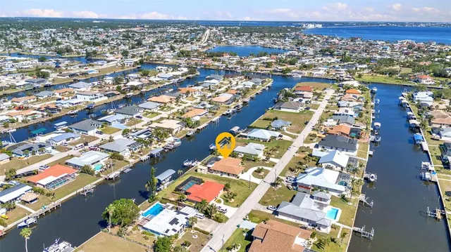 $600,000 | 122 Colonial Street Southeast, Port Charlotte, FL 33952