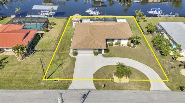 $600,000 | 122 Colonial Street Southeast, Port Charlotte, FL 33952