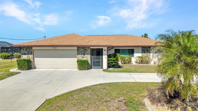 $600,000 | 122 Colonial Street Southeast, Port Charlotte, FL 33952