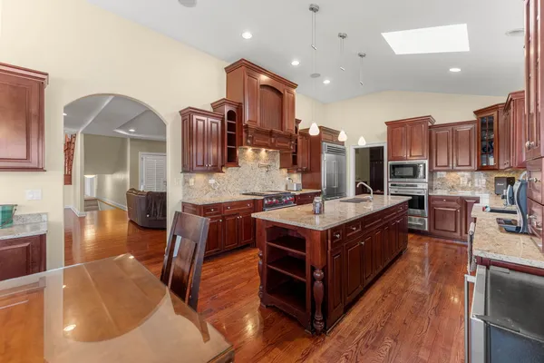 a kitchen with granite countertop a sink and a granite counter tops