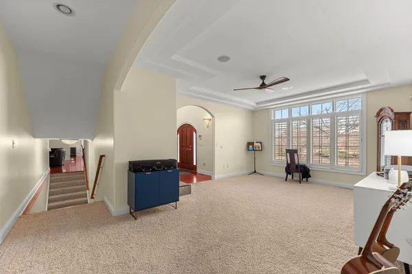 a big room with closet and windows