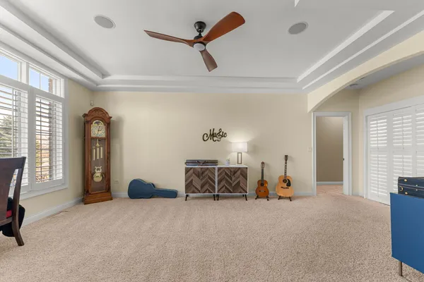 a living room with furniture fireplace and flat screen tv