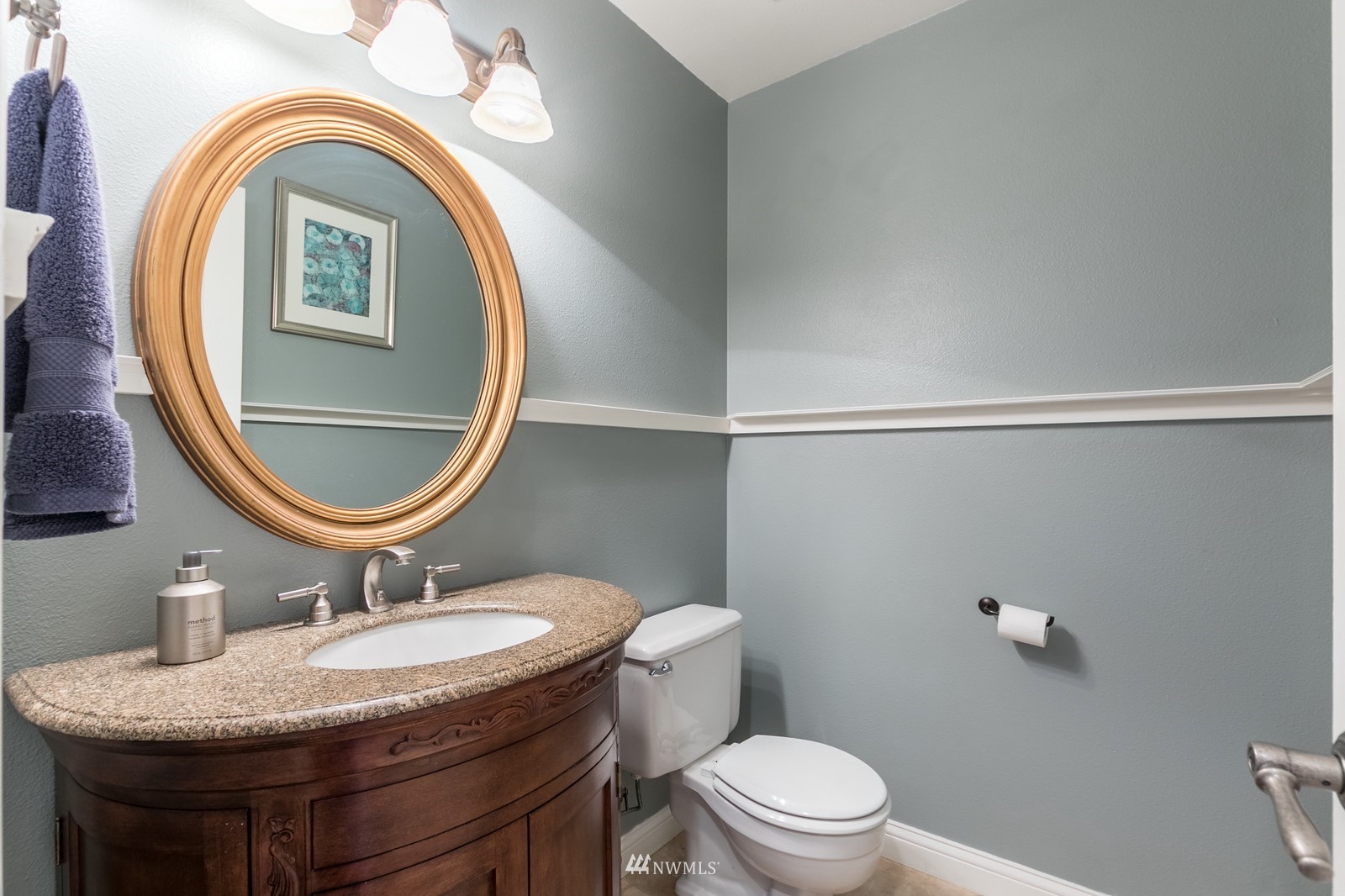 7413 Vandermark Road East Bonney Lake, WA 98391 - Photo 17 of 39 a bathroom with a sink and a mirror