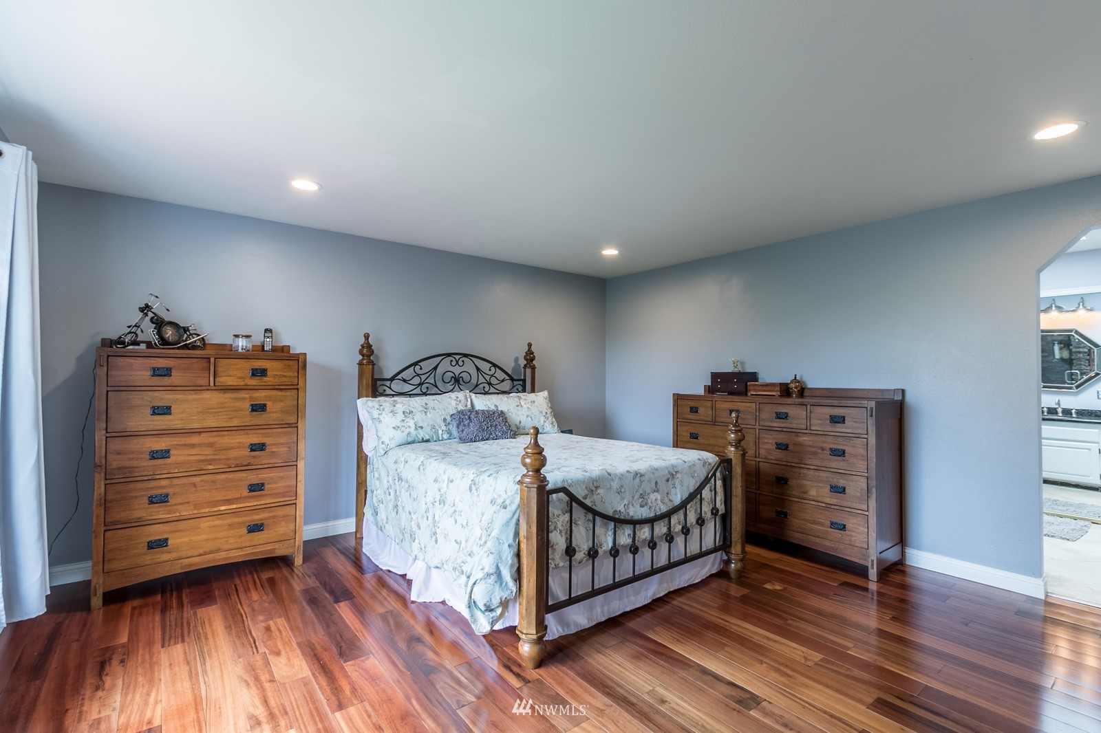 7413 Vandermark Road East Bonney Lake, WA 98391 - Photo 20 of 39 a room with a baby crib dresser and a dresser