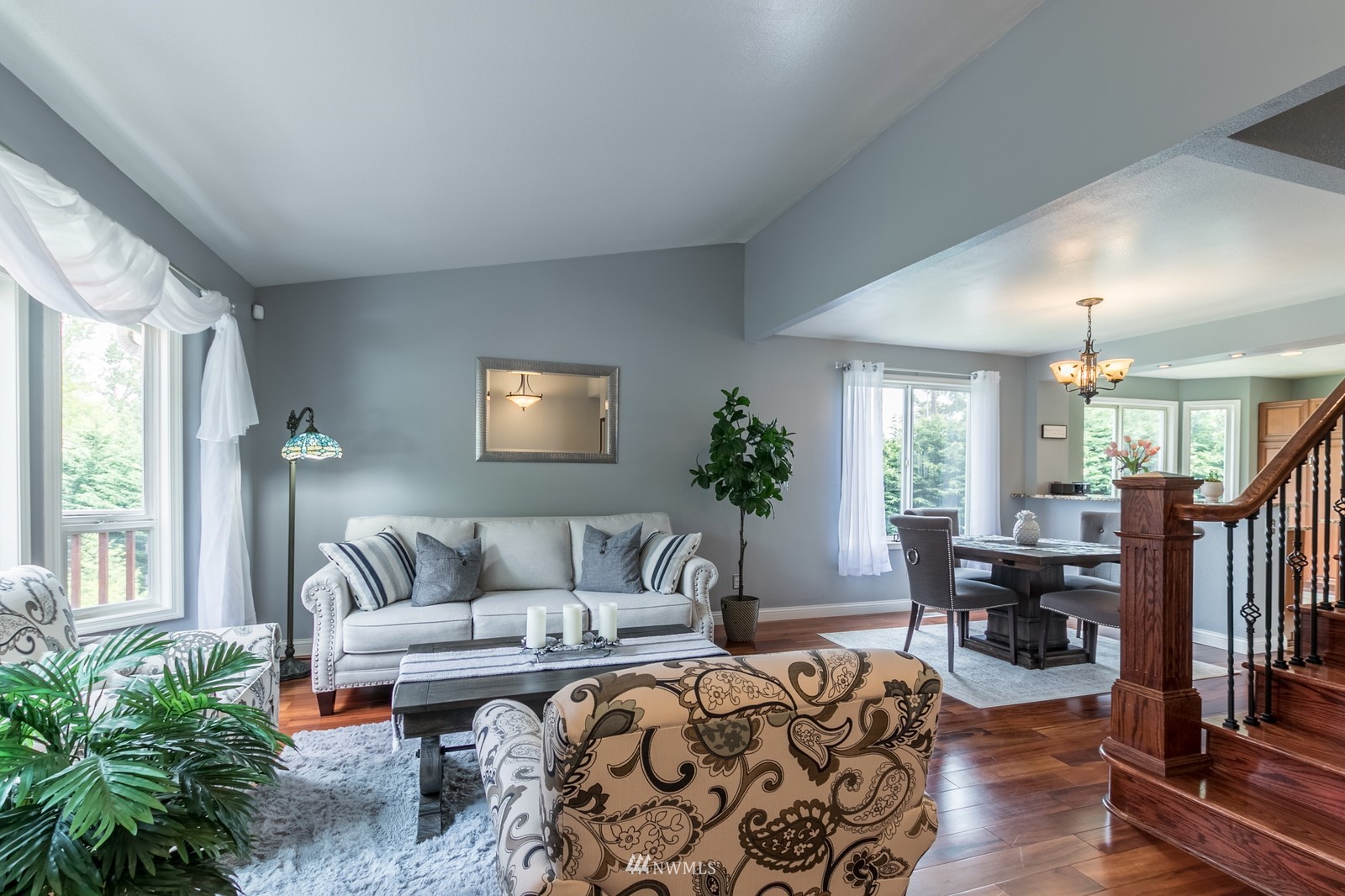 7413 Vandermark Road East Bonney Lake, WA 98391 - Photo 2 of 39 a living room with furniture and a potted plant