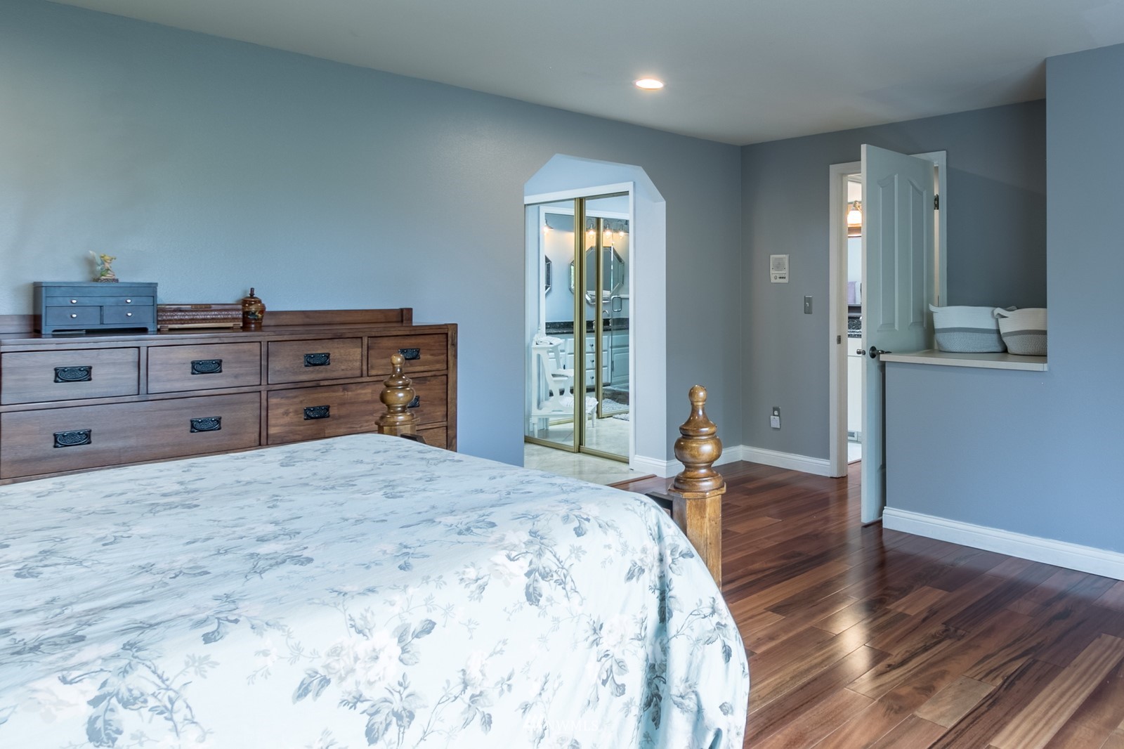 7413 Vandermark Road East Bonney Lake, WA 98391 - Photo 21 of 39 a bedroom with a bed and a dresser