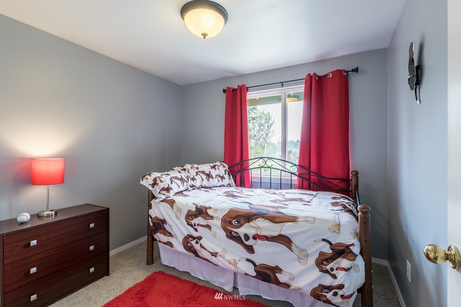 7413 Vandermark Road East Bonney Lake, WA 98391 - Photo 28 of 39 a bedroom with a bed and a window
