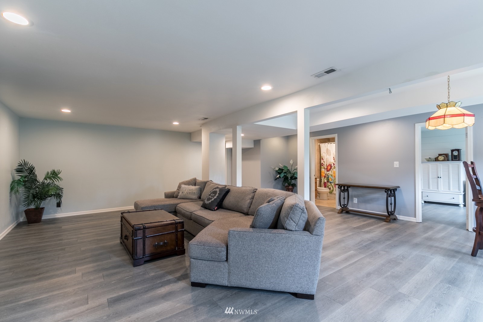 7413 Vandermark Road East Bonney Lake, WA 98391 - Photo 32 of 39 a living room with furniture and a fireplace