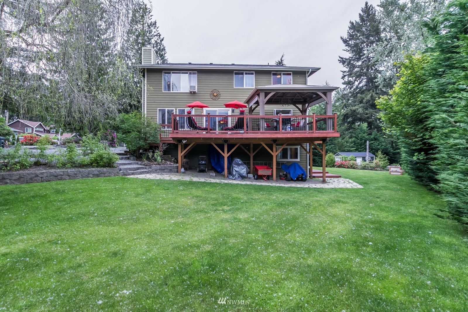 7413 Vandermark Road East Bonney Lake, WA 98391 - Photo 37 of 39 a view of a chairs and tables in the garden