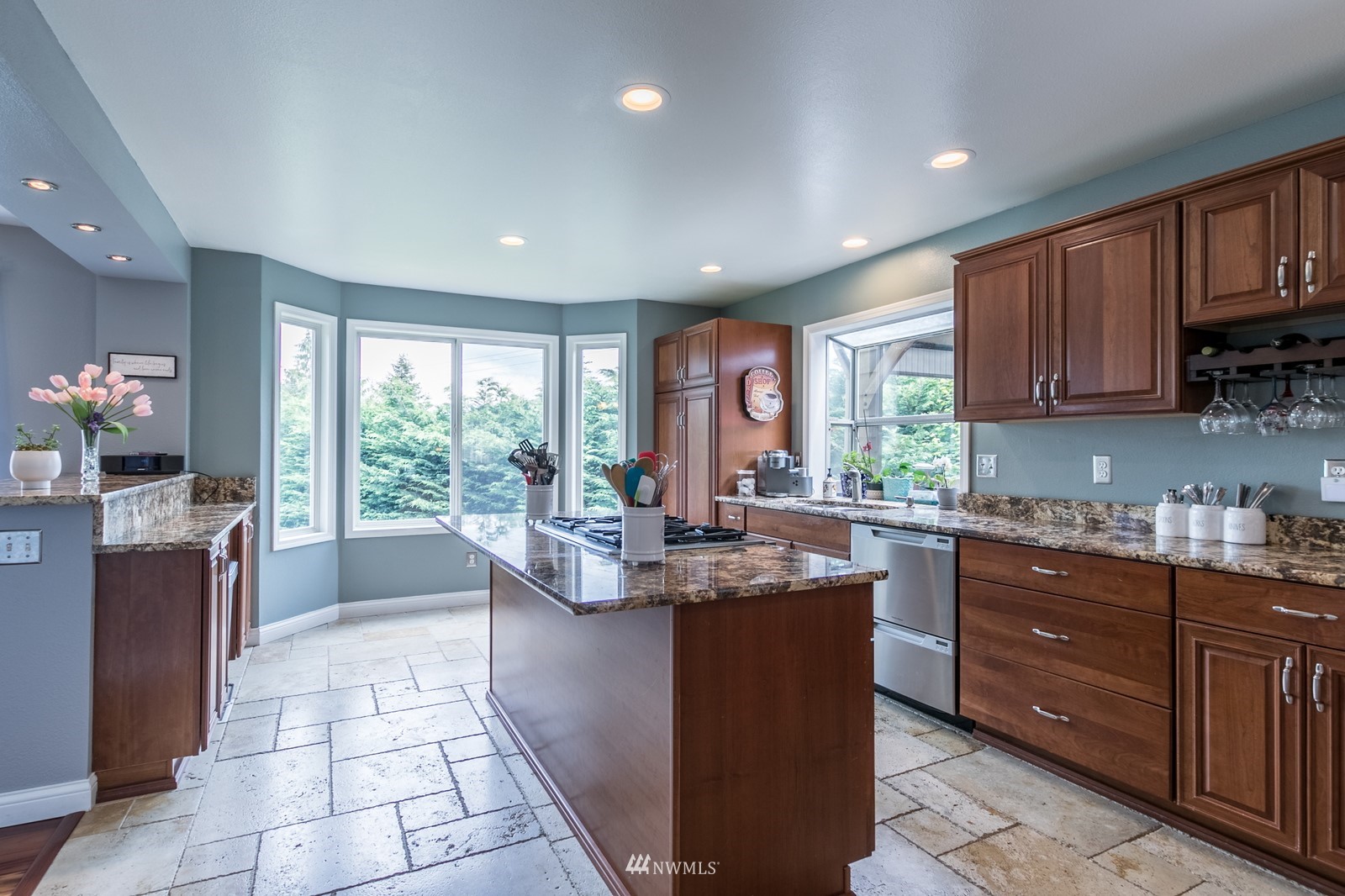 7413 Vandermark Road East Bonney Lake, WA 98391 - Photo 10 of 39 a kitchen with sink cabinets and appliances