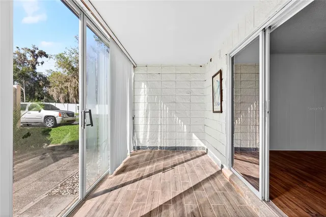 a bathroom with a tub and shower view