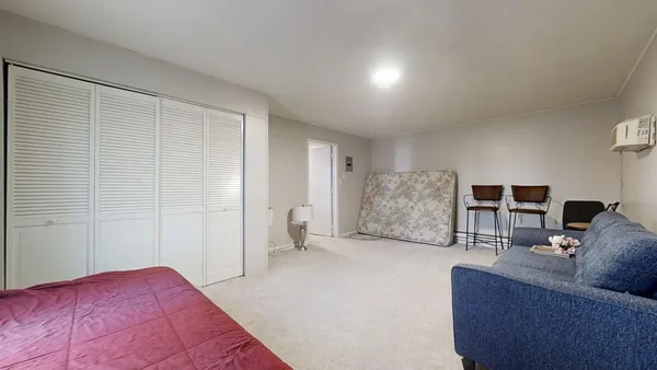 a living room with furniture and a couch