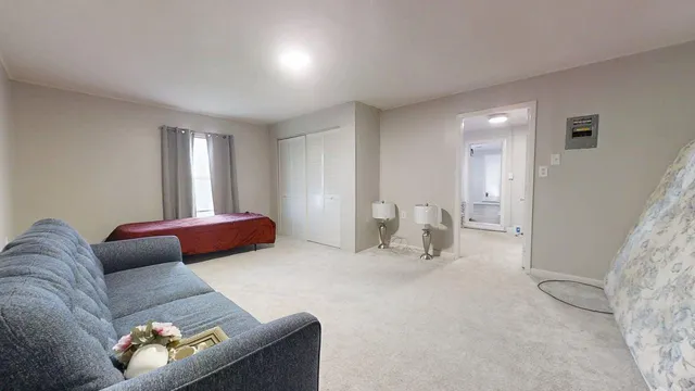 a living room with furniture and a couch