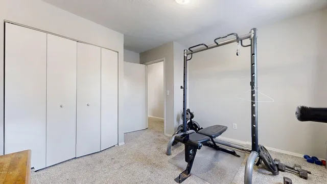 a view of a room with gym equipment