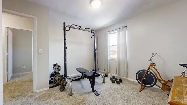 a view of a room with gym equipment