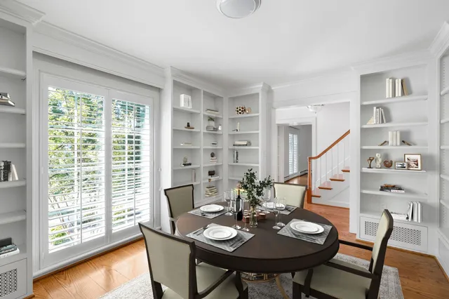a large kitchen with stainless steel appliances granite countertop a stove and a sink