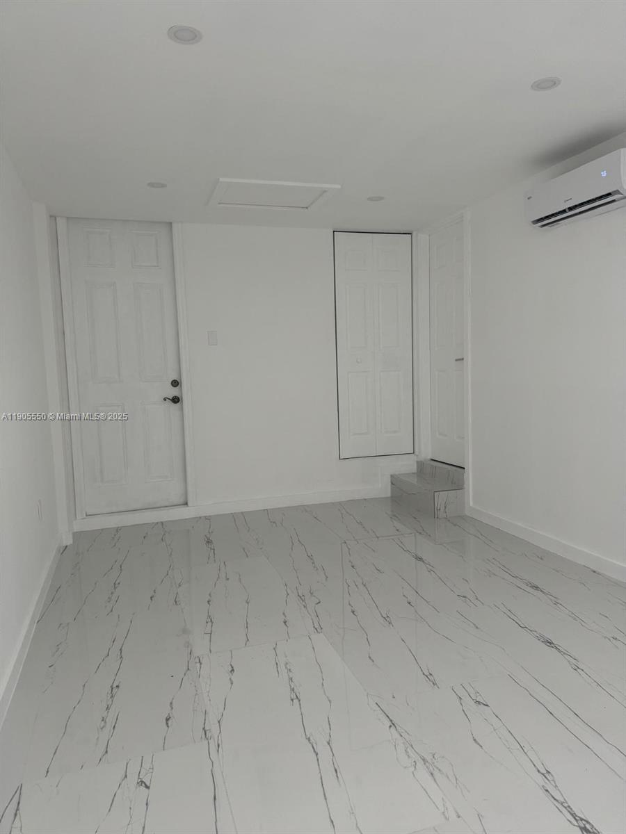 29621 Southwest 165th Court Homestead, FL 33033 - Photo 5 of 7 a view of an empty room