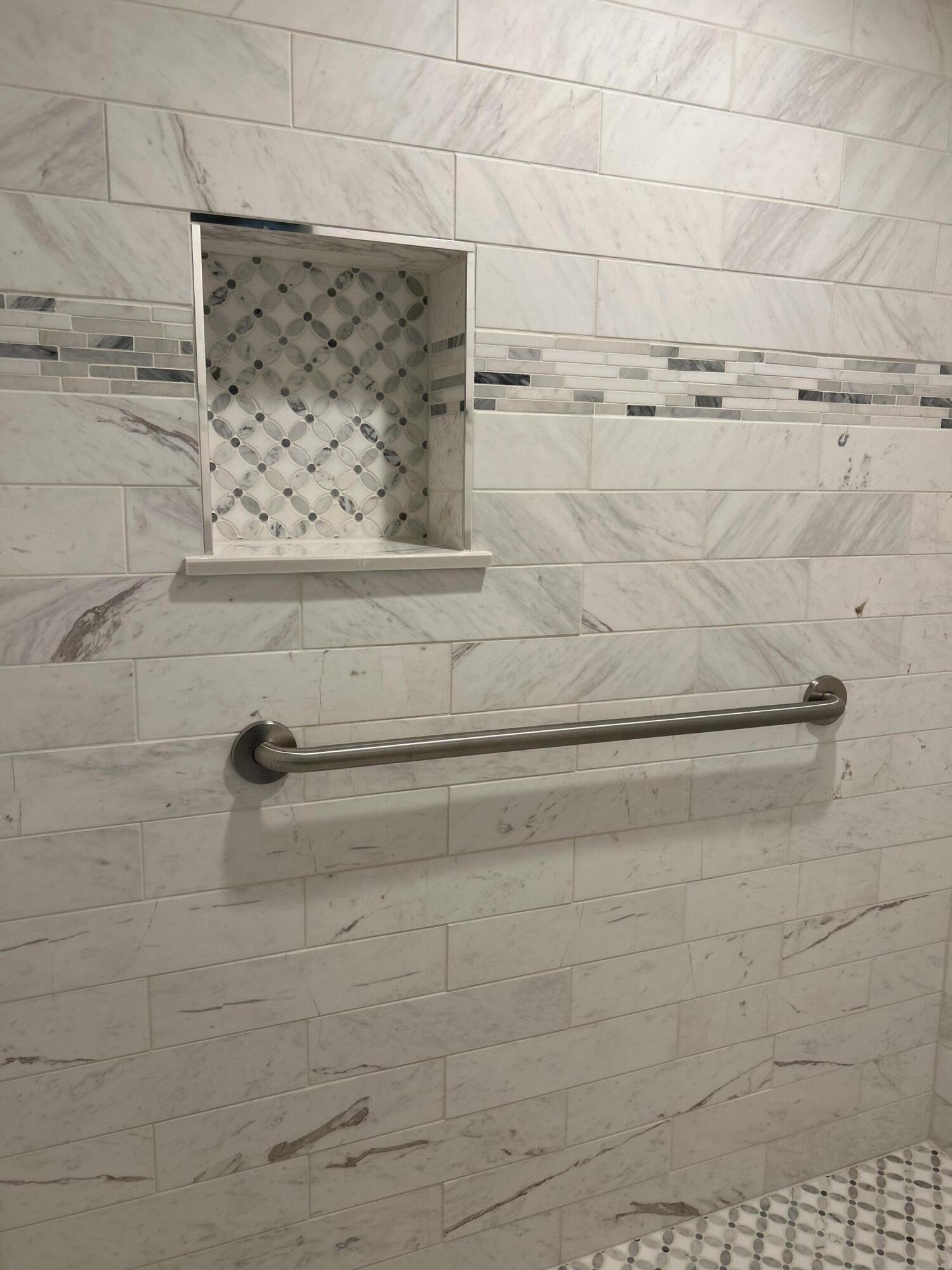 529 Fire Fly Trail, Unit 2 Hartford, WI 53027 - Photo 27 of 50 Grab Bar in Walk In Shower Primary BA