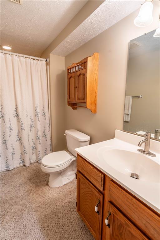 228 Country View Drive Lower Burrell, PA 15068 - Photo 35 of 49 a bathroom with a sink a toilet and a mirror