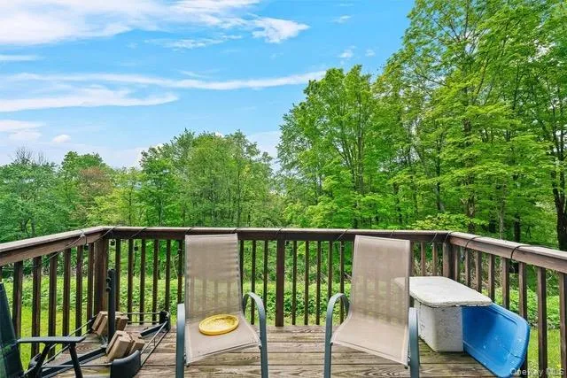 a view of a chair in a balcony