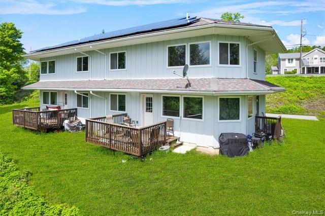 448 Old Mountain Road Port Jervis, NY 12771 - Photo 2 of 29 a front view of a house with garden