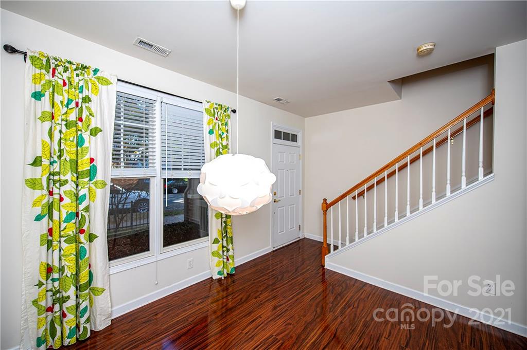 1135 Market Street, Unit 552 Fort Mill, SC 29708 - Photo 4 of 27 a view of entryway with wooden floor