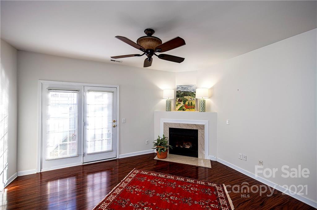 1135 Market Street, Unit 552 Fort Mill, SC 29708 - Photo 8 of 27 a living room with furniture and a fireplace