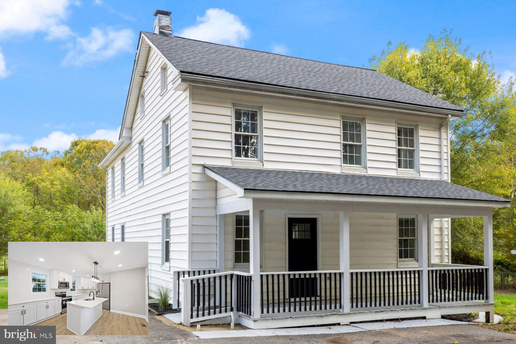 a front view of a house with a porch