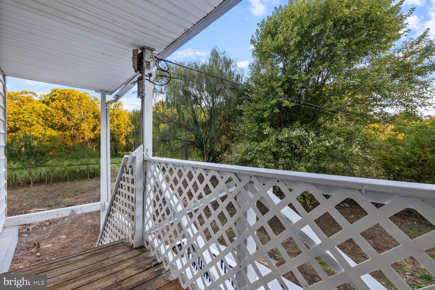 8109 Old Hagerstown Road Middletown, MD 21769 - Photo 25 of 54 a view of a patio with a wooden fence