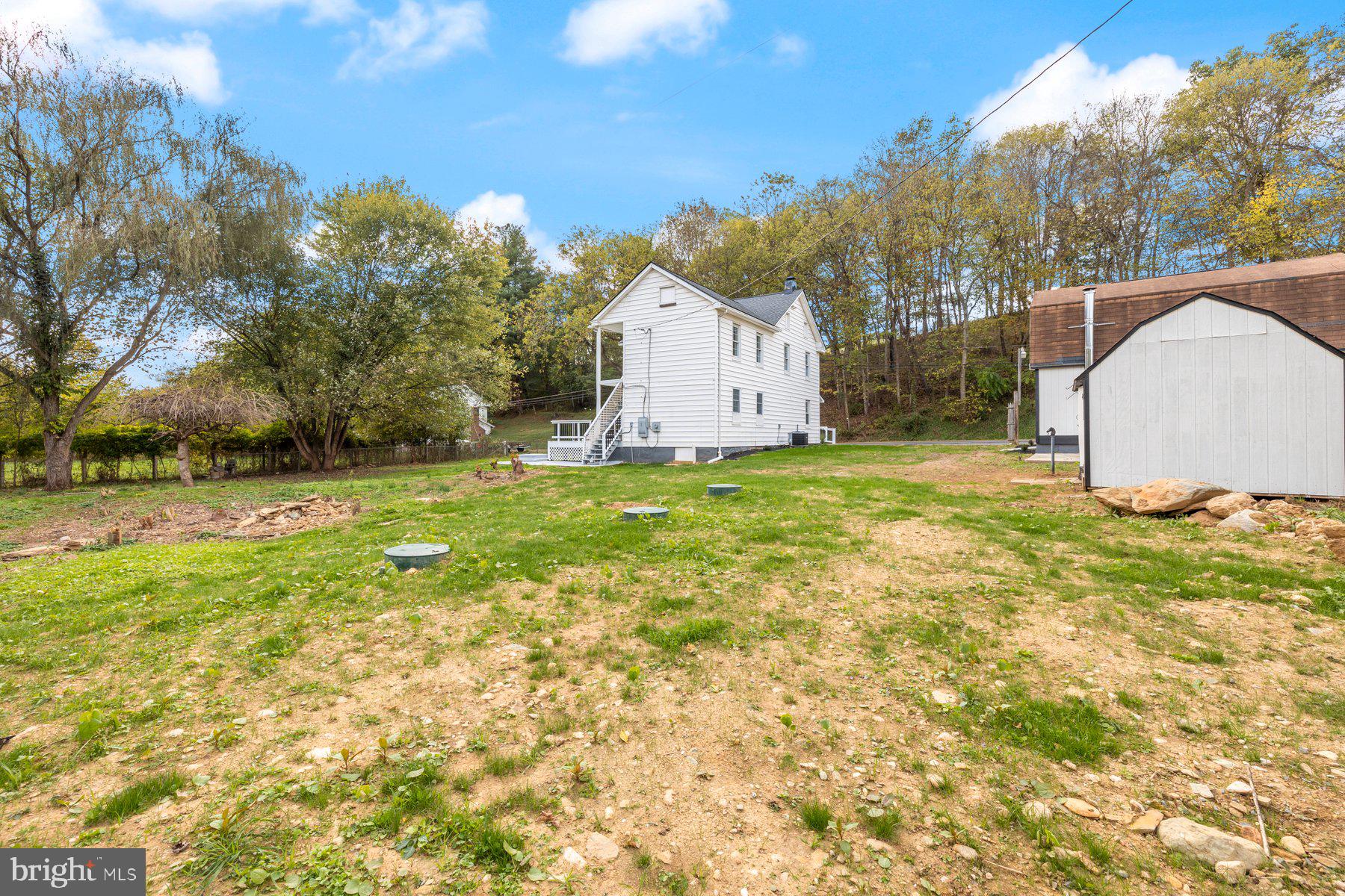8109 Old Hagerstown Road Middletown, MD 21769 - Photo 31 of 54 a view of a house with a yard