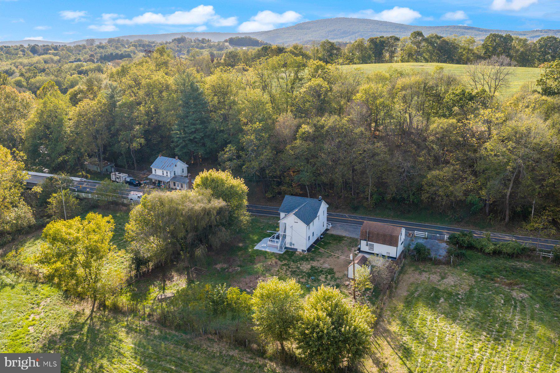 8109 Old Hagerstown Road Middletown, MD 21769 - Photo 46 of 54 a view of a lake with a mountain