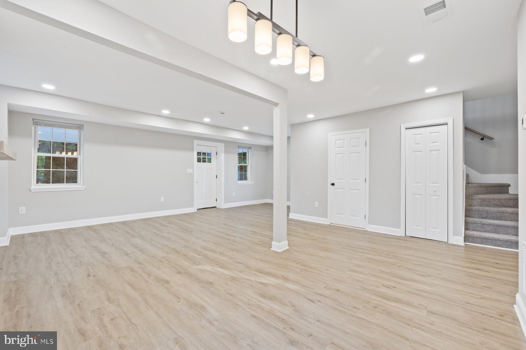 8109 Old Hagerstown Road Middletown, MD 21769 - Photo 6 of 54 a view of an empty room with wooden floor