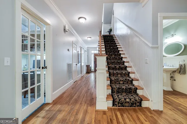 a view of a livingroom with furniture and windows