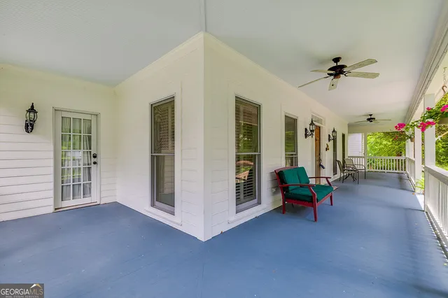 a room with furniture and a window