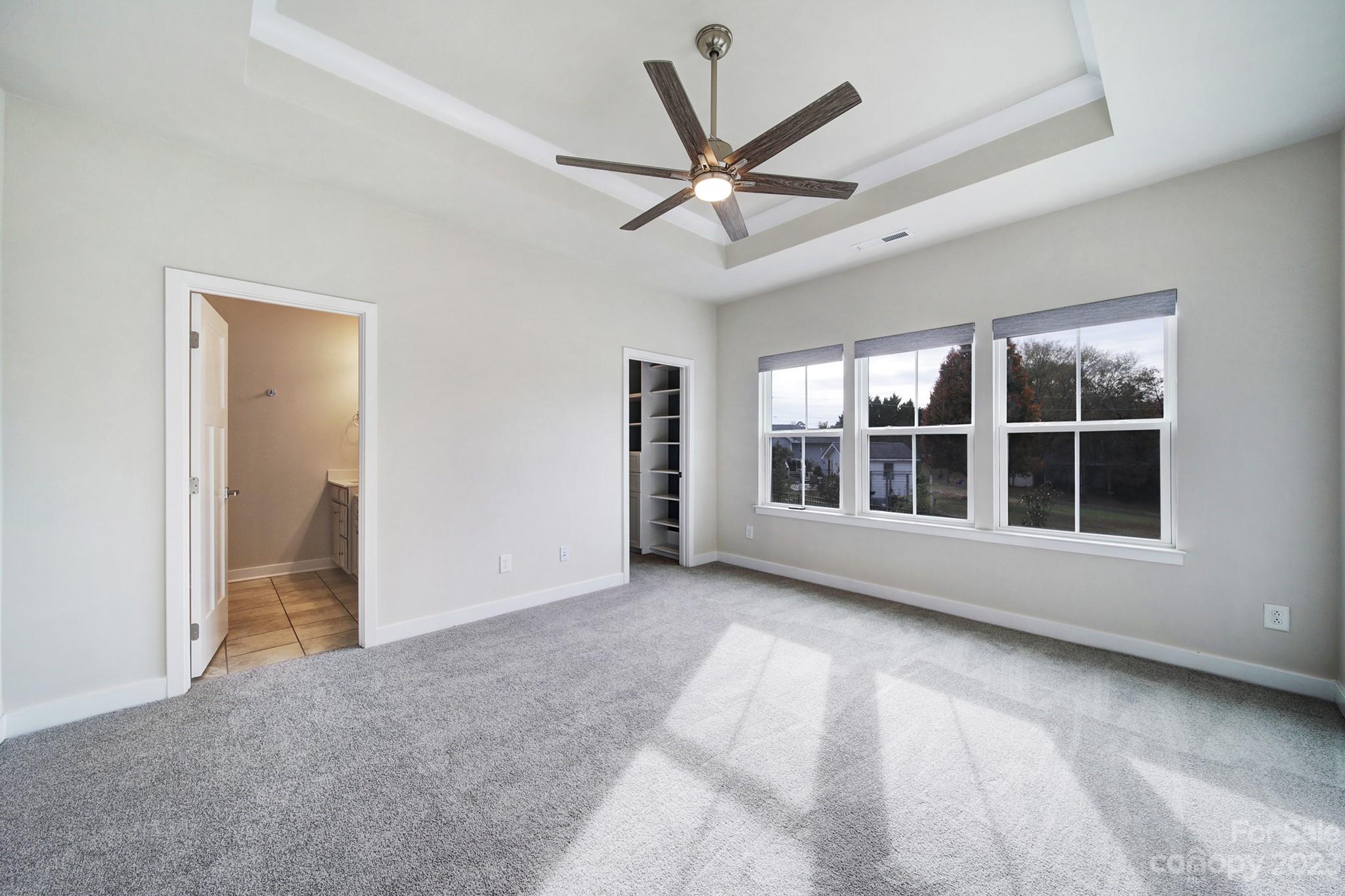 622 Crudent Road Tega Cay, SC 29708 - Photo 29 of 40 a view of an empty room with a window