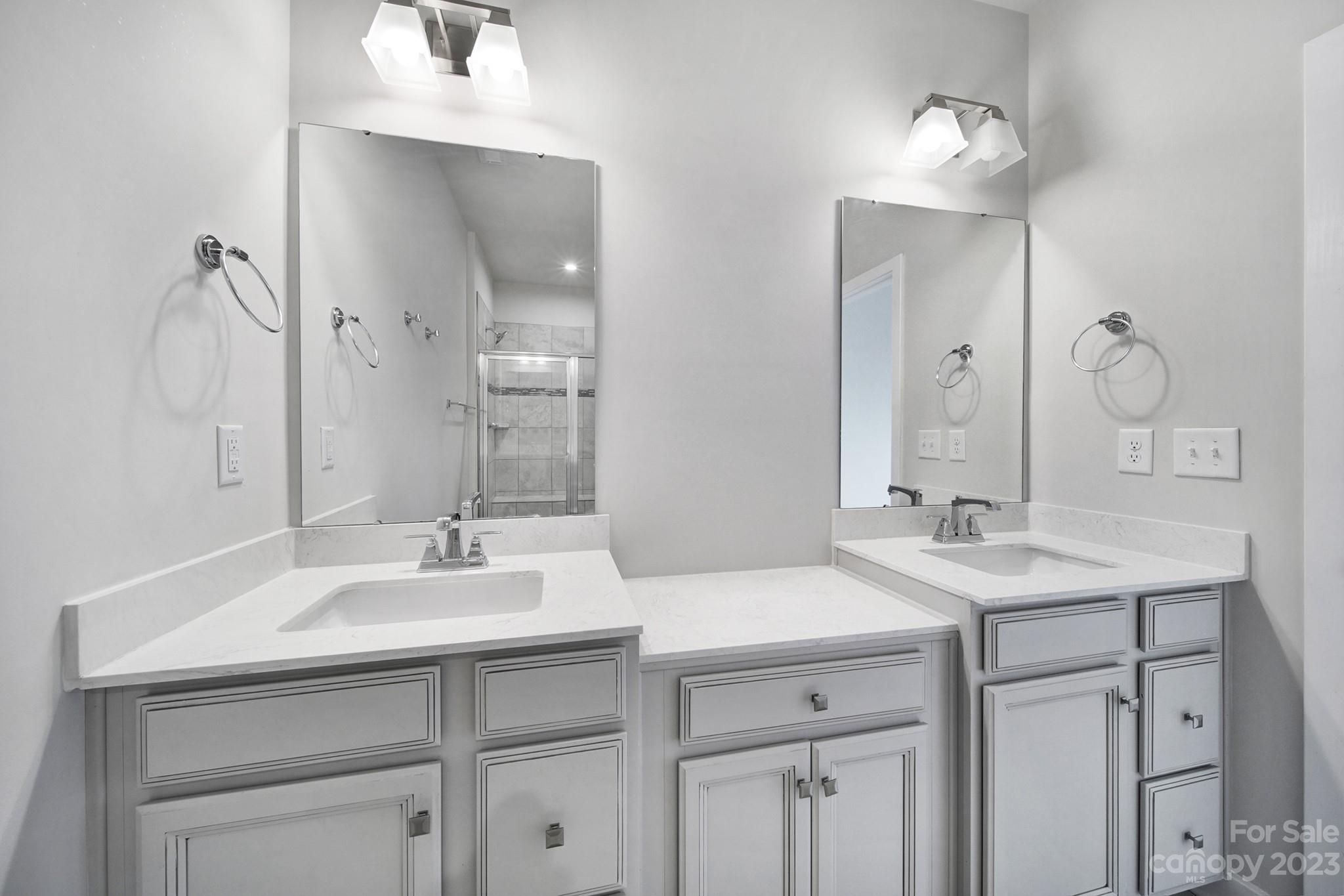 622 Crudent Road Tega Cay, SC 29708 - Photo 34 of 40 a bathroom with a sink and a mirror