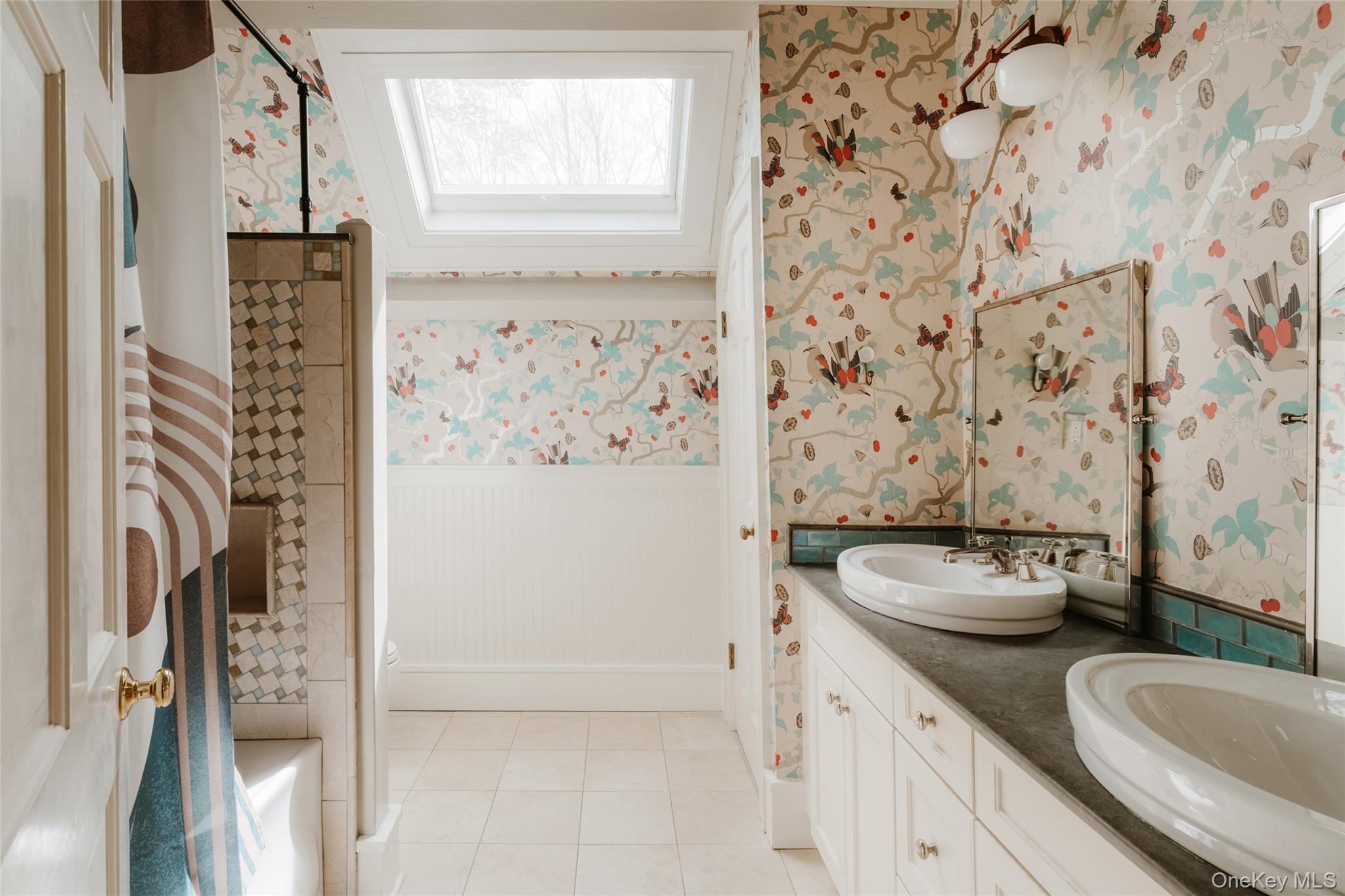 1046 Bulls Head Road Clinton Corners, NY 12514 - Photo 22 of 46 a bathroom with a granite countertop sink a toilet and a shower curtain