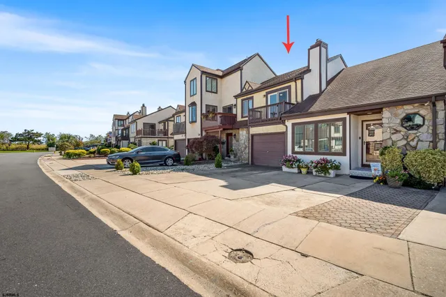 a building with trees in front of it