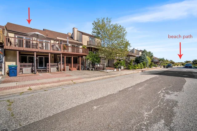 a front view of a building and a street