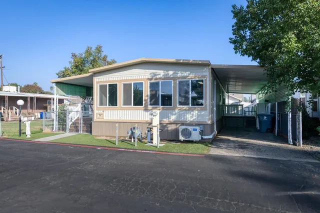 a view of a kitchen with a sink hardwood floor and a kitchen counter top space
