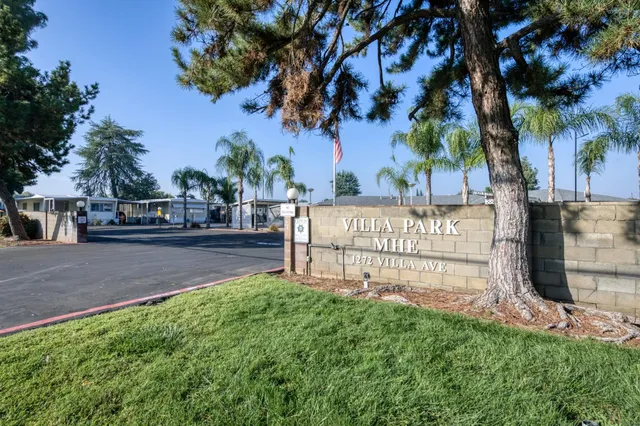 a view of a swimming pool with an outdoor seating