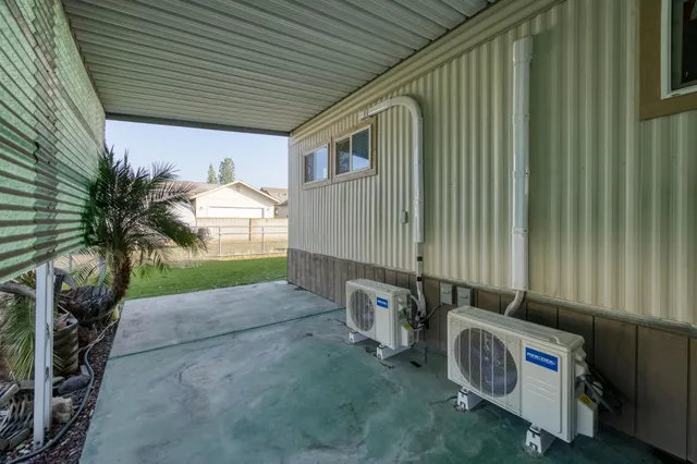 a backyard of a house with seating space