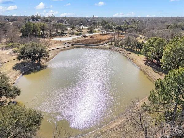 a view of a lake in middle of the town