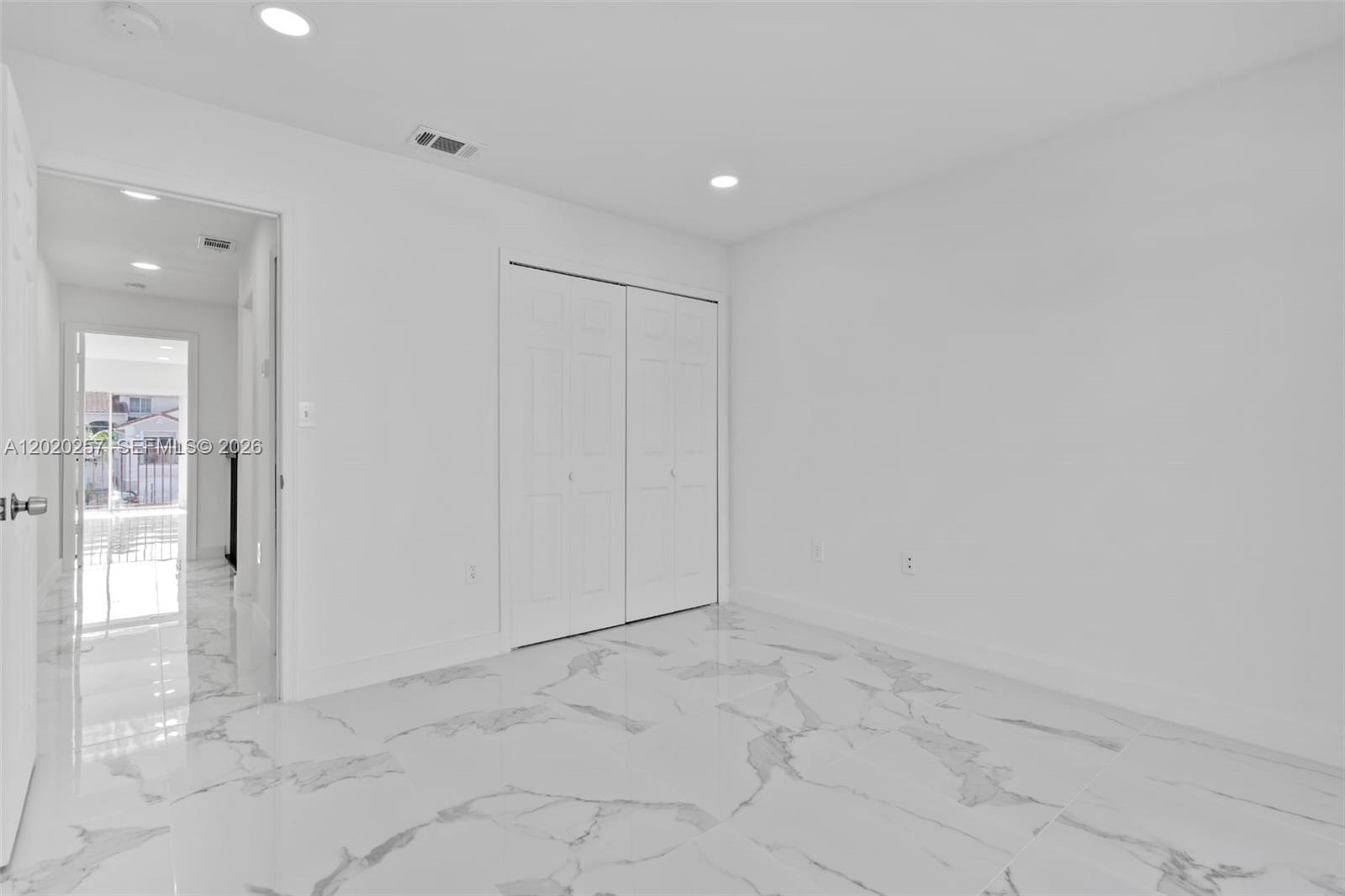 10245 Southwest 154th Place, Unit 1123 Miami, FL 33196 - Photo 13 of 38 a view of an empty room