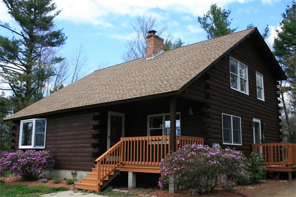 150 East County Road Rutland, MA 01543 - Photo 1 of 23 a front view of a house with garden