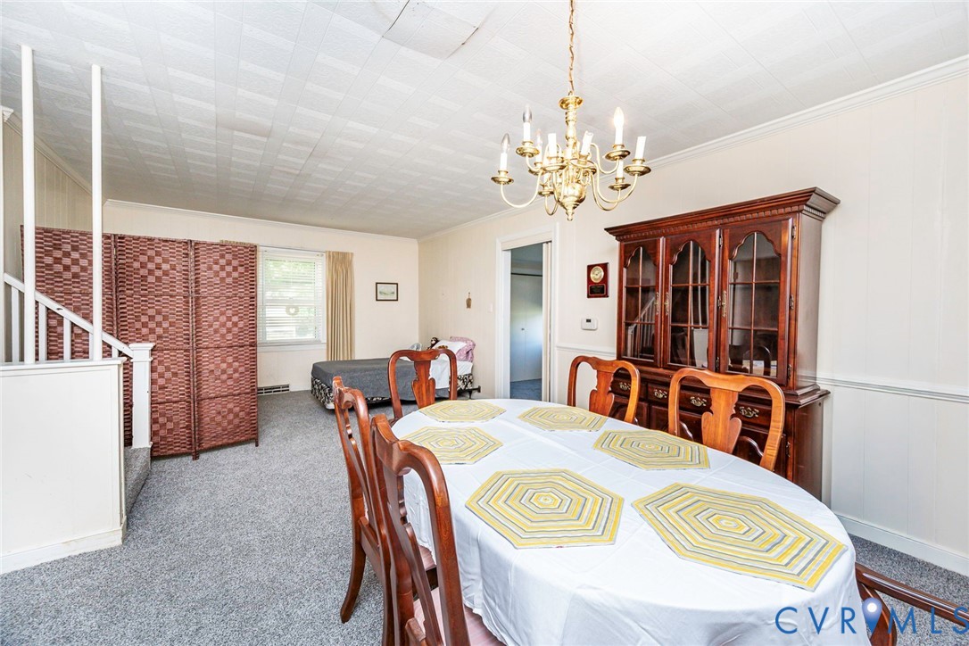 4912 Water View Road Water View, VA 23180 - Photo 19 of 42 Recessed ceiling, wainscoting, and a chandelier il
