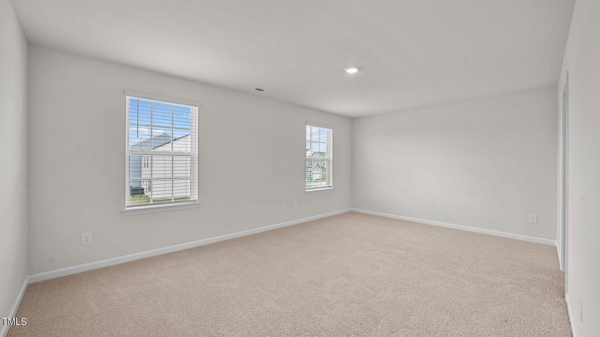 210 River Bank Road Fuquay-Varina, NC 27526 - Photo 22 of 36 an empty room with a window